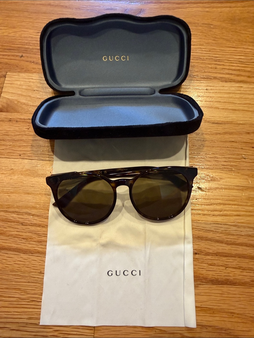 Gucci Tortoiseshell Sunglasses with Round Brown Lenses